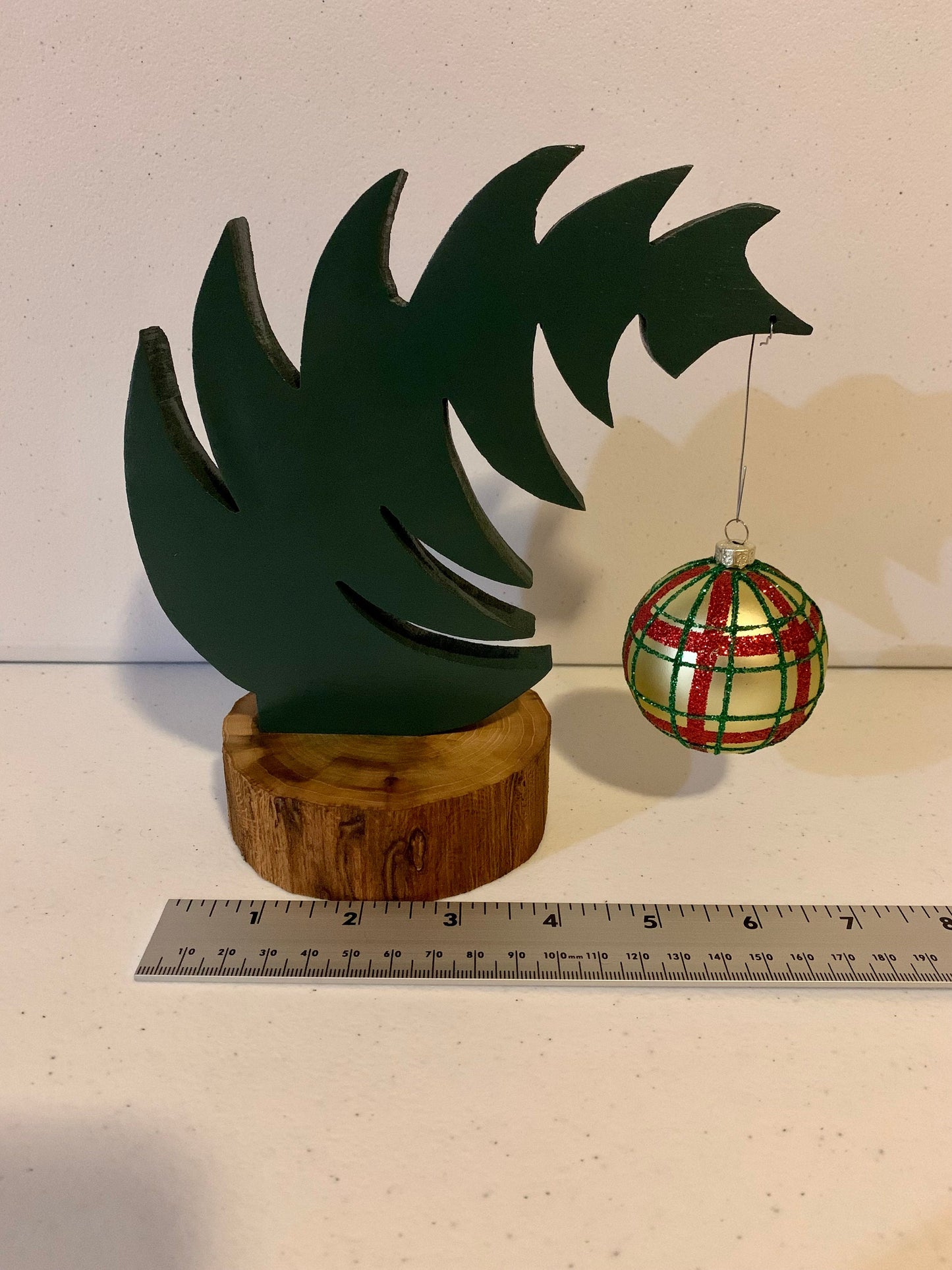 Small Leaning "Grinch Style" Christmas Tree With Natural Tree Trunk Base