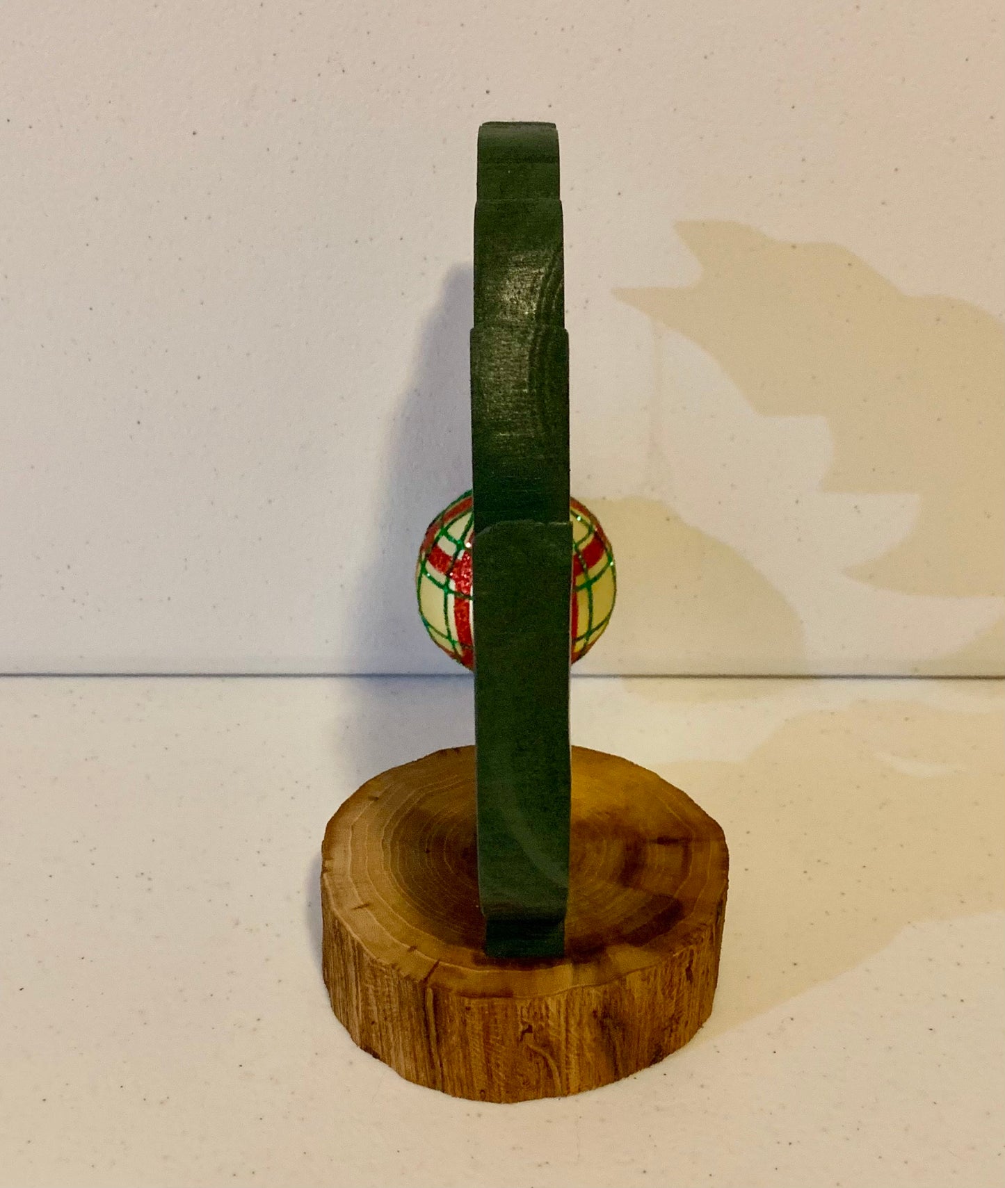 Small Leaning "Grinch Style" Christmas Tree With Natural Tree Trunk Base