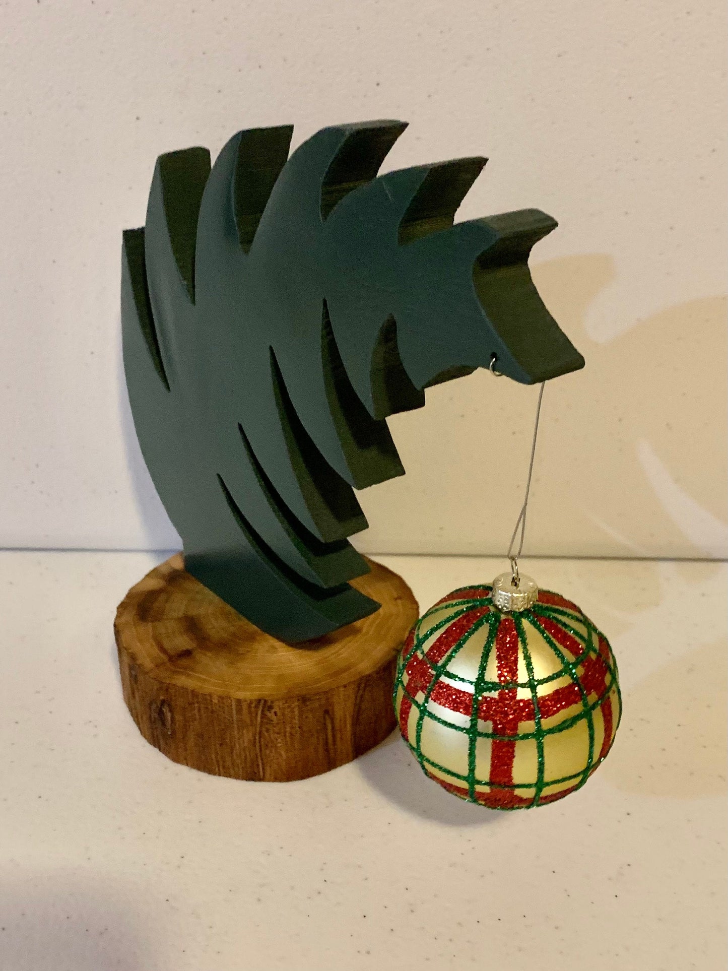 Small Leaning "Grinch Style" Christmas Tree With Natural Tree Trunk Base