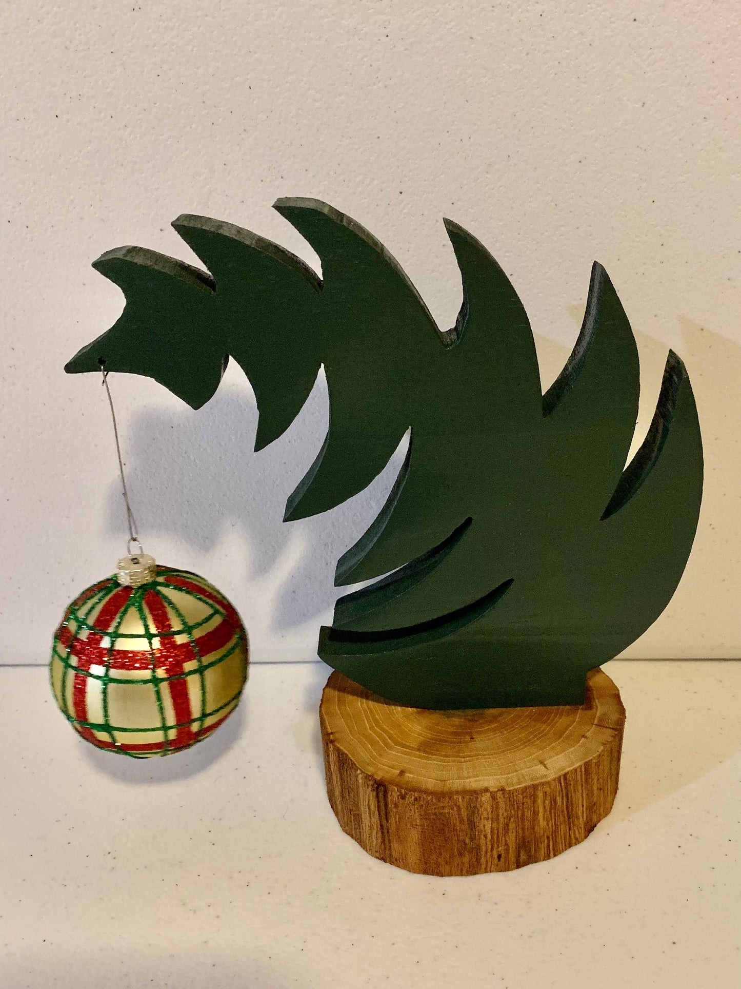 Small Leaning "Grinch Style" Christmas Tree With Natural Tree Trunk Base