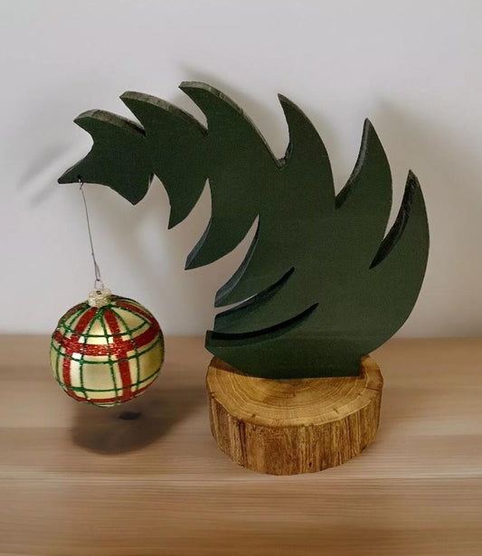 Small Leaning "Grinch Style" Christmas Tree With Natural Tree Trunk Base